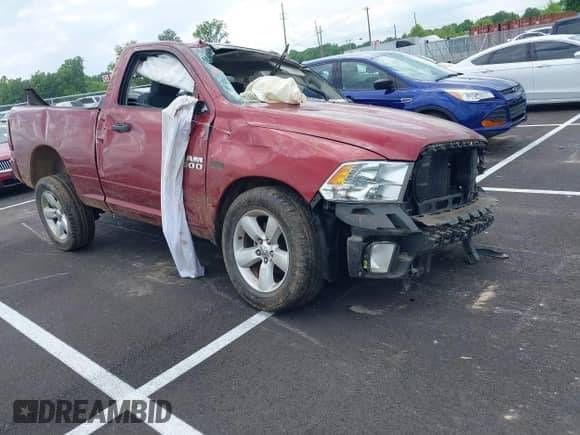 2014 Ram 1500 Express z VIN 3C6JR6ATXEG310186, wystawiony jako IAAI lot #42221601 z przebiegiem 56 684 mil mil oraz . Historia ofert i sprzedaży dostępna na DreamBid. Obrazek 1.