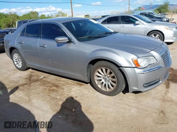 2014 Chrysler 300 with VIN 2C3CCAAG2EH382657, listed as a IAAI auction lot 43487115 with 212,933 mi miles and . Bid and sale history available at DreamBid. Image 1.