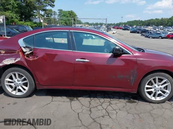 2013 Nissan Maxima SV z VIN 1N4AA5AP3DC834462, wystawiony jako IAAI lot #42783351 z przebiegiem 187 671 mil mil oraz . Historia ofert i sprzedaży dostępna na DreamBid. Obrazek 13.