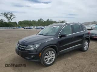 2014 Volkswagen Tiguan SE with VIN WVGBV3AX7EW567541, listed as a Copart auction lot 57116685 with 330,606 mi miles and Salvage title. Bid and sale history available at DreamBid. Image 1.