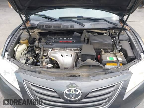 2007 Toyota Camry CE z VIN JTNBE46K273093358, wystawiony jako IAAI lot #43213288 z przebiegiem 221 969 mil mil oraz . Historia ofert i sprzedaży dostępna na DreamBid. Obrazek 10.