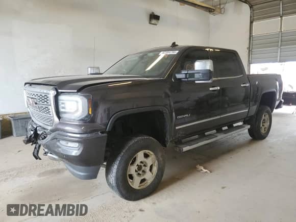 2016 GMC Sierra 1500 Denali z VIN 3GTU2PEJ6GG144177, wystawiony jako Copart lot #62304795 z przebiegiem 197 675 mil mil oraz Czysty tytuł • Clean title. Historia ofert i sprzedaży dostępna na DreamBid. Obrazek 1.