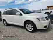 2015 Dodge Journey SXT with VIN 3C4PDDBG1FT593741, listed as a Copart auction lot 71986735 with 182,841 mi miles and Clean title. Bid and sale history available at DreamBid. Image 4.