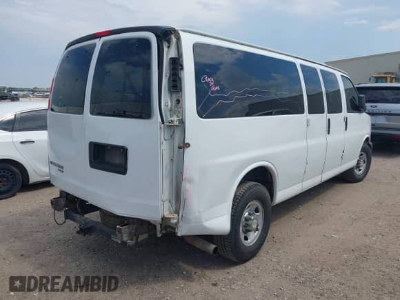 2014 Chevrolet Express Passenger LT with VIN 1GAZG1FG0E1158913, listed as a IAAI auction lot 43037460 with 149,212 mi miles and . Bid and sale history available at DreamBid. Image 4.