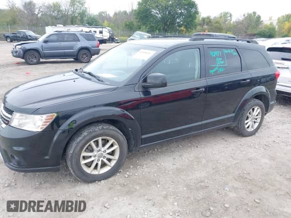 2015 Dodge Journey SXT with VIN 3C4PDDBG3FT532987, listed as a IAAI auction lot 43208141 with 128,366 mi miles and . Bid and sale history available at DreamBid. Image 2.
