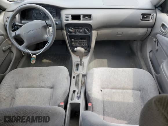 2002 Chevrolet Prizm с VIN 1Y1SK52852Z407762, выставлен на аукционе Copart как лот 59411165 с пробегом Не указан миль и Списание • Salvage title. История ставок и продаж доступна на DreamBid. Изображение 8.