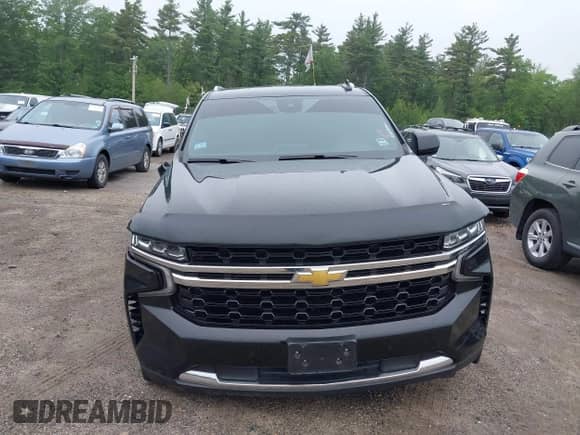 2023 Chevrolet Suburban LS z VIN 1GNSKBKD9PR154654, wystawiony jako IAAI lot #42475123 z przebiegiem 131 529 mil mil oraz . Historia ofert i sprzedaży dostępna na DreamBid. Obrazek 13.