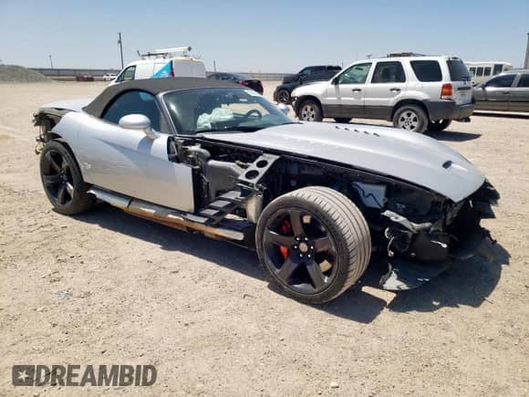 2004 Dodge Viper SRT-10 with VIN 1B3JZ65Z24V101801, listed as a Copart auction lot 57433105 with 21,314 mi miles and Salvage title. Bid and sale history available at DreamBid. Image 4.