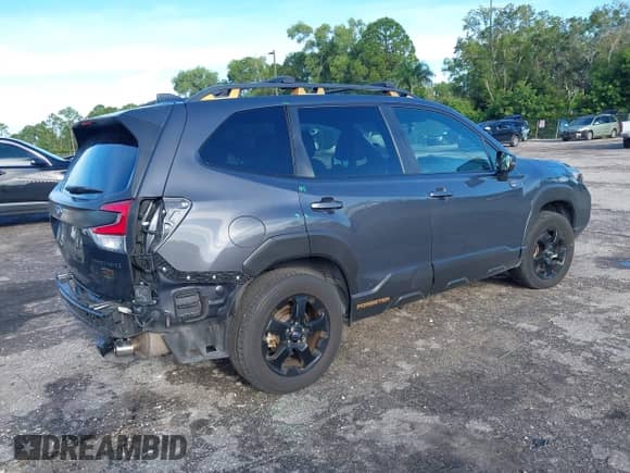 2022 Subaru Forester Wilderness with VIN JF2SKAMC4NH423882, listed as a IAAI auction lot 43272111 with 77,225 mi miles and . Bid and sale history available at DreamBid. Image 4.