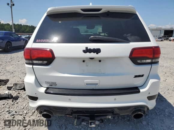 2017 Jeep Grand Cherokee SRT z VIN 1C4RJFDJXHC738652, wystawiony jako Copart lot #61984665 z przebiegiem 108 202 mil mil oraz Szkoda całkowita • Salvage title. Historia ofert i sprzedaży dostępna na DreamBid. Obrazek 6.