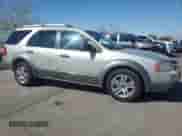 2006 Ford Freestyle SE with VIN 1FMZK011X6GA00401, listed as a Copart auction lot 56218835 with 148,590 mi miles and Salvage title. Bid and sale history available at DreamBid. Image 4.