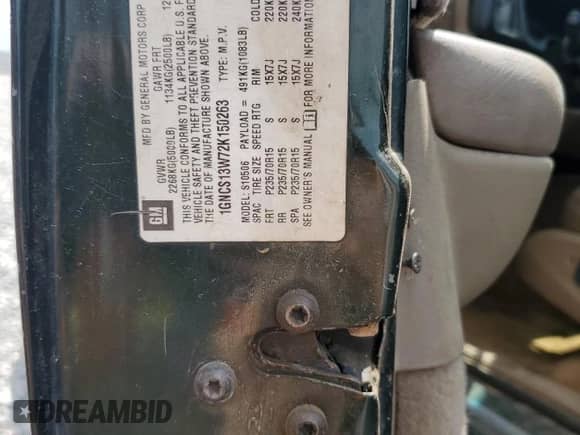 2002 Chevrolet Blazer LS z VIN 1GNCS13W72K150263, wystawiony jako Copart lot #66051005 z przebiegiem 103 669 mil mil oraz Szkoda całkowita • Salvage title. Historia ofert i sprzedaży dostępna na DreamBid. Obrazek 14.