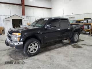 2009 Chevrolet Colorado 2LT with VIN 1GCDT13EX98120229, listed as a Copart auction lot 90946225 with 140,756 mi miles and Clean title. Bid and sale history available at DreamBid. Image 1.