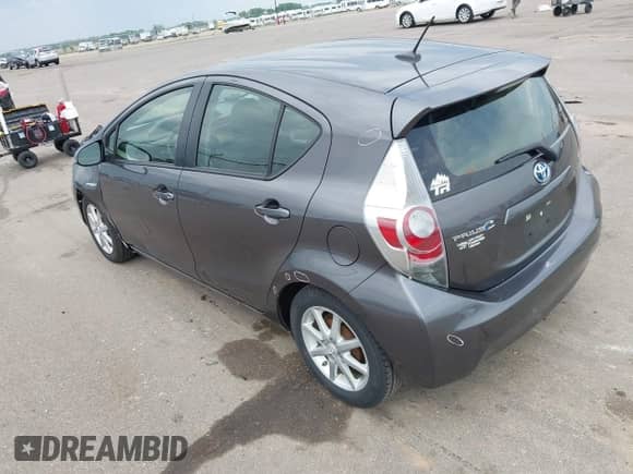 2014 Toyota Prius One with VIN JTDKDTB31E1570290, listed as a IAAI auction lot 42441474 with 164,068 mi miles and . Bid and sale history available at DreamBid. Image 3.