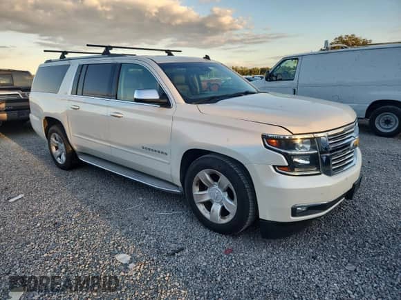2015 Chevrolet Suburban LTZ с VIN 1GNSKKKC0FR250825, выставлен на аукционе Copart как лот 87227505 с пробегом 72 264 миль миль и Чистый • Clean title. История ставок и продаж доступна на DreamBid. Изображение 4.