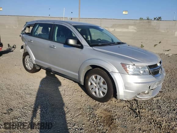 2013 Dodge Journey American Value с VIN 3C4PDCAB2DT671814, выставлен на аукционе Copart как лот 82746025 с пробегом 118 890 миль миль и Списание • Salvage title. История ставок и продаж доступна на DreamBid. Изображение 4.