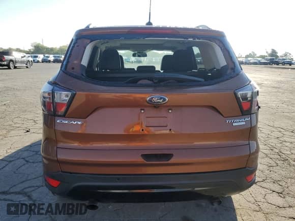 2017 Ford Escape Titanium с VIN 1FMCU0JD0HUB37779, выставлен на аукционе Copart как лот 84385835 с пробегом 126 814 миль миль и Чистый • Clean title. История ставок и продаж доступна на DreamBid. Изображение 6.
