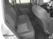 2011 Jeep Compass with VIN 1J4NT1FA6BD173305, listed as a Copart auction lot 87358405 with 112,019 mi miles and Salvage title. Bid and sale history available at DreamBid. Image 11.