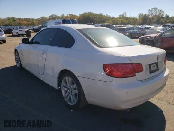 2013 BMW 3 Series 328i xDrive with VIN WBAKF3C5XDJ385984, listed as a Copart auction lot 85873615 with 214,976 mi miles and Salvage title. Bid and sale history available at DreamBid. Image 2.