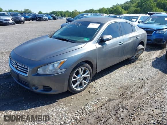 2014 Nissan Maxima S with VIN 1N4AA5AP6EC461404, listed as a IAAI auction lot 43054214 with 116,067 mi miles and . Bid and sale history available at DreamBid. Image 2.