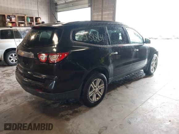2015 Chevrolet Traverse LT with VIN 1GNKVHKD7FJ287503, listed as a IAAI auction lot 43138804 with 162,271 mi miles and . Bid and sale history available at DreamBid. Image 4.