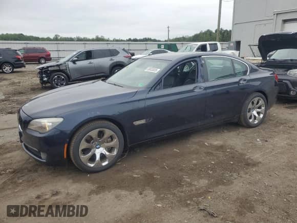 2012 BMW 7 Series 750i xDrive with VIN WBAKC6C52CDX99493, listed as a Copart auction lot 69933035 with 117,809 mi miles and Salvage title. Bid and sale history available at DreamBid. Image 1.