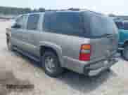 2003 Chevrolet Suburban LT z VIN 1GNFK16Z13J199808, wystawiony jako IAAI lot #42404012 z przebiegiem 242 232 mil mil oraz . Historia ofert i sprzedaży dostępna na DreamBid. Obrazek 3.