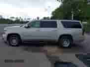 2016 Chevrolet Suburban LT z VIN 1GNSCHKCXGR282232, wystawiony jako IAAI lot #42650483 z przebiegiem 143 325 mil mil oraz . Historia ofert i sprzedaży dostępna na DreamBid. Obrazek 14.