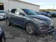 2018 Hyundai Santa Fe 2.4L with VIN 5XYZTDLBXJG546447, listed as a Copart auction lot 65197905 with 75,551 mi miles and Salvage title. Bid and sale history available at DreamBid. Image 4.
