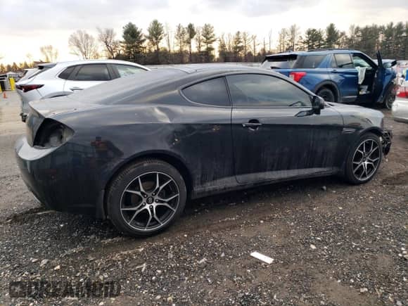2008 Hyundai Tiburon GS with VIN KMHHM66D38U265807, listed as a Copart auction lot 42229755 with 217,206 mi miles and Salvage title. Bid and sale history available at DreamBid. Image 3.