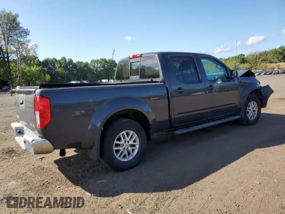 2015 Nissan Frontier SV с VIN 1N6AD0FV6FN717295, выставлен на аукционе Copart как лот 71227675 с пробегом 99 081 миль миль и Списание • Salvage title. История ставок и продаж доступна на DreamBid. Изображение 3.