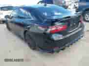 2023 Toyota Camry TRD with VIN 4T1KZ1AK7PU072266, listed as a IAAI auction lot 43208479 with 58,999 mi miles and . Bid and sale history available at DreamBid. Image 3.