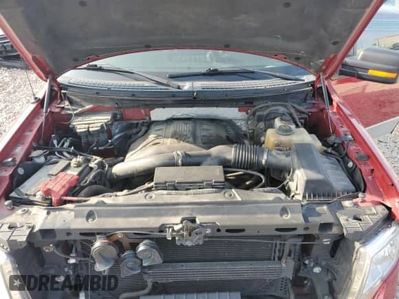 2012 Ford F-150 XL z VIN 1FTFW1ET1CKD66916, wystawiony jako Copart lot #71893375 z przebiegiem 88 321 mil mil oraz Szkoda całkowita • Salvage title. Historia ofert i sprzedaży dostępna na DreamBid. Obrazek 11.