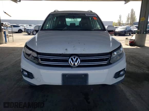 2012 Volkswagen Tiguan S с VIN WVGCV7AX2CW515758, выставлен на аукционе Copart как лот 52456355 с пробегом 179 907 миль миль и Чистый • Clean title. История ставок и продаж доступна на DreamBid. Изображение 5.