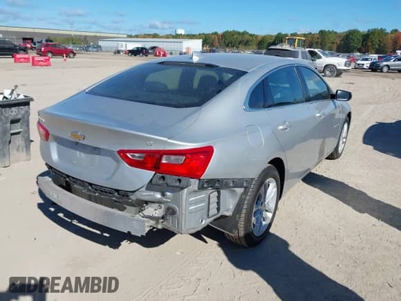 2018 Chevrolet Malibu LT z VIN 1G1ZD5STXJF268187, wystawiony jako IAAI lot #43439529 z przebiegiem 97 042 mil mil oraz . Historia ofert i sprzedaży dostępna na DreamBid. Obrazek 4.