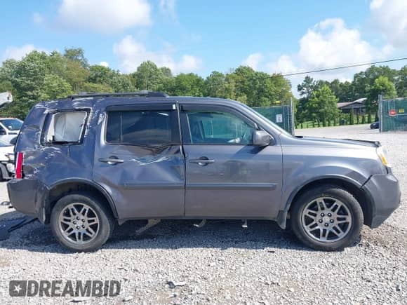 2014 Honda Pilot EX-L with VIN 5FNYF4H54EB023024, listed as a IAAI auction lot 43023941 with 155,356 mi miles and . Bid and sale history available at DreamBid. Image 13.