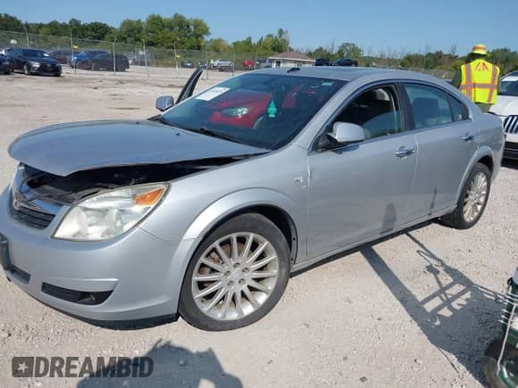 2009 Saturn Aura XR с VIN 1G8ZX57799F190355, выставлен на аукционе IAAI как лот 43165839 с пробегом 115 586 миль миль и . История ставок и продаж доступна на DreamBid. Изображение 2.
