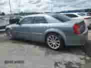 2006 Chrysler 300 C SRT-8 with VIN 2C3LA73W16H423780, listed as a Copart auction lot 56702105 with 93,826 mi miles and Salvage title. Bid and sale history available at DreamBid. Image 2.