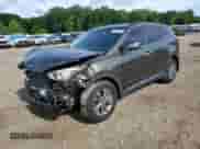 2014 Hyundai Santa Fe with VIN 5XYZU3LB3EG221720, listed as a Copart auction lot 58599005 with 81,218 mi miles and Salvage title. Bid and sale history available at DreamBid. Image 1.
