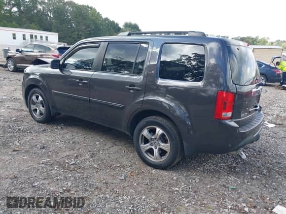 2013 Honda Pilot EX-L with VIN 5FNYF4H59DB013703, listed as a IAAI auction lot 43324425 with 248,844 mi miles and . Bid and sale history available at DreamBid. Image 3.