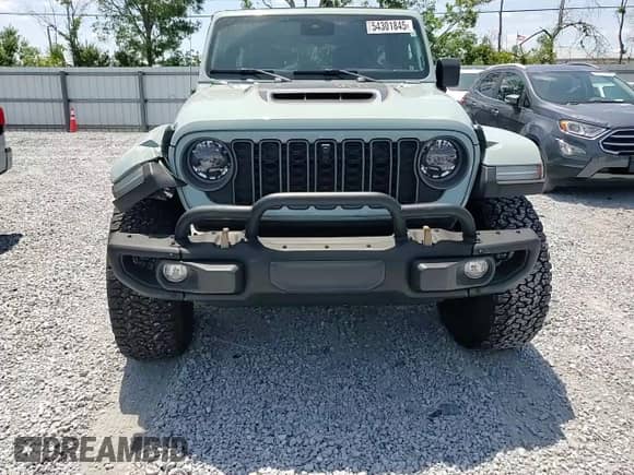 2023 Jeep Wrangler Rubicon 20th Anniversary with VIN 1C4JJXSJ9PW672632, listed as a Copart auction lot 54301845 with 14,111 mi miles and Salvage title. Bid and sale history available at DreamBid. Image 14.