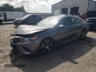 2019 Toyota Camry Hybrid SE с VIN 4T1B21HK2KU521372, выставлен на аукционе Copart как лот 85365895 с пробегом 79 115 миль миль и Списание • Salvage title. История ставок и продаж доступна на DreamBid. Изображение 1.