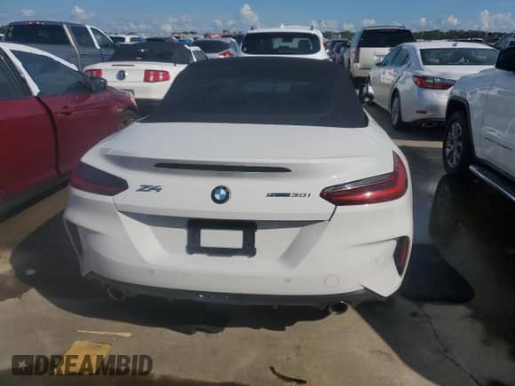 2021 BMW Z4 sDrive30i z VIN WBAHF3C09MWX24087, wystawiony jako Copart lot #73919214 z przebiegiem Nie podano mil oraz Szkoda całkowita • Salvage title. Historia ofert i sprzedaży dostępna na DreamBid. Obrazek 6.