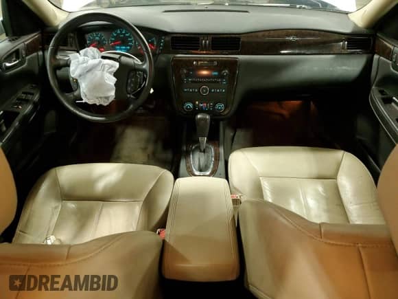 2012 Chevrolet Impala LTZ with VIN 2G1WC5E36C1332186, listed as a Copart auction lot 62693225 with 162,202 mi miles and Salvage title. Bid and sale history available at DreamBid. Image 8.