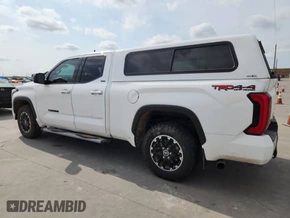 2023 Toyota Tundra SR5 with VIN 5TFLA5DA7PX087942, listed as a Copart auction lot 89802885 with 220,821 mi miles and Clean title. Bid and sale history available at DreamBid. Image 2.