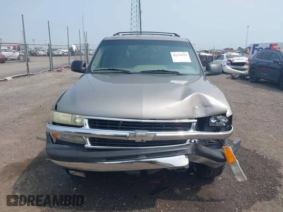 2003 Chevrolet Tahoe LS z VIN 1GNEC13Z43R124163, wystawiony jako IAAI lot #42374254 z przebiegiem 231 335 mil mil oraz . Historia ofert i sprzedaży dostępna na DreamBid. Obrazek 13.