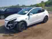 2023 Tesla Model Y Long Range с VIN 7SAYGAEE5PF708297, выставлен на аукционе IAAI как лот 42927362 с пробегом 27 230 миль миль и . История ставок и продаж доступна на DreamBid. Изображение 2.