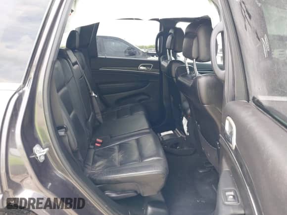 2021 Jeep Grand Cherokee 80th Anniversary with VIN 1C4RJFBG0MC504148, listed as a IAAI auction lot 42063979 with 77,941 mi miles and . Bid and sale history available at DreamBid. Image 8.