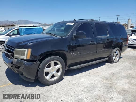 2009 Chevrolet Suburban 2LT с VIN 1GNFC26059R277392, выставлен на аукционе Copart как лот 63123855 с пробегом 140 843 миль миль и Списание • Salvage title. История ставок и продаж доступна на DreamBid. Изображение 1.