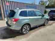 2018 Subaru Forester Premium z VIN JF2SJAECXJH568131, wystawiony jako Copart lot #81117215 z przebiegiem 86 856 mil mil oraz Szkoda całkowita • Salvage title. Historia ofert i sprzedaży dostępna na DreamBid. Obrazek 3.